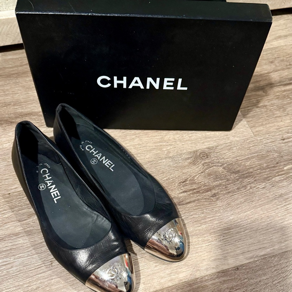 CHANEL Black and Silver Flats with Metallic Cap Toe